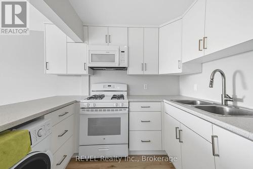 14 Bond Street, St. Catharines (Downtown), ON - Indoor Photo Showing Kitchen With Double Sink