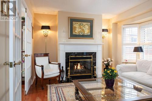 30 - 1415 Hazelton Boulevard, Burlington, ON - Indoor Photo Showing Living Room With Fireplace