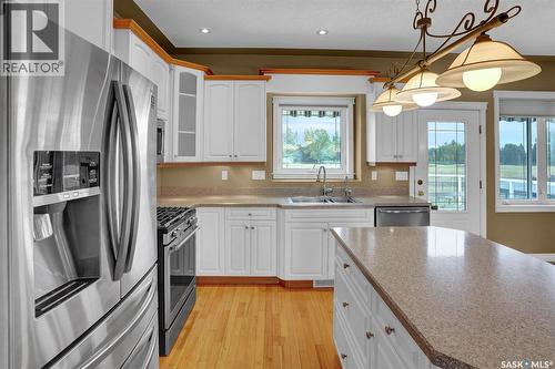 21 Woods Crescent, Edenwold Rm No.158, SK - Indoor Photo Showing Kitchen With Double Sink