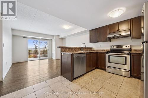 206 - 60 Lynnmore Street, Guelph (Pineridge/Westminster Woods), ON - Indoor Photo Showing Kitchen