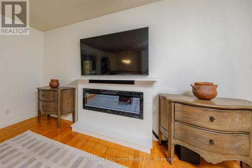 27 Dawson Drive, Kincardine, ON - Indoor Photo Showing Living Room With Fireplace