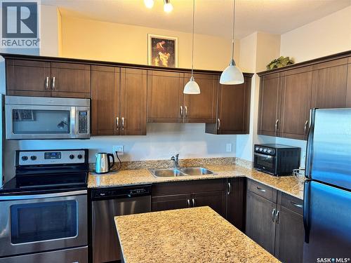 205 710 Hart Road, Saskatoon, SK - Indoor Photo Showing Kitchen With Double Sink