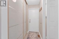 Mudroom area with door to double garage - 