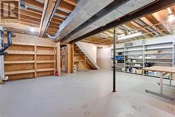 Lower level rec room area; door to garage - 