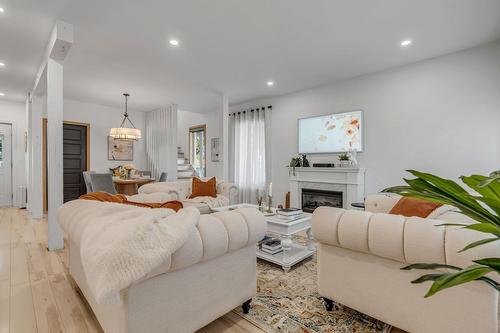 Vue d'ensemble - 30 Rue St-Raphaël, Québec (Beauport), QC - Indoor Photo Showing Living Room With Fireplace