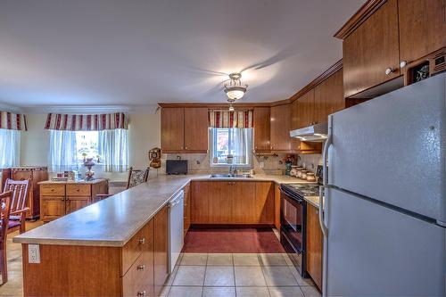 Cuisine - 101-1245 Rue François-Corbeil, Terrebonne (Terrebonne), QC - Indoor Photo Showing Kitchen With Double Sink