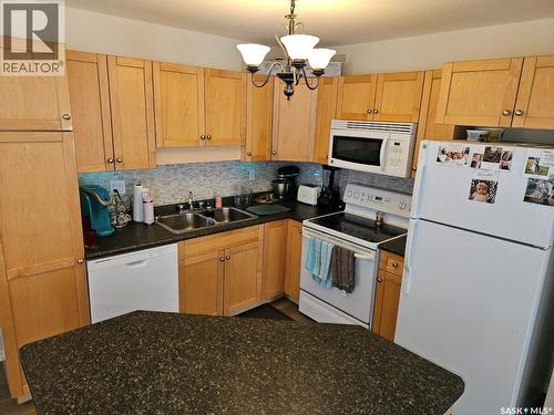 30 118 Pawlychenko Lane, Saskatoon, SK - Indoor Photo Showing Kitchen With Double Sink