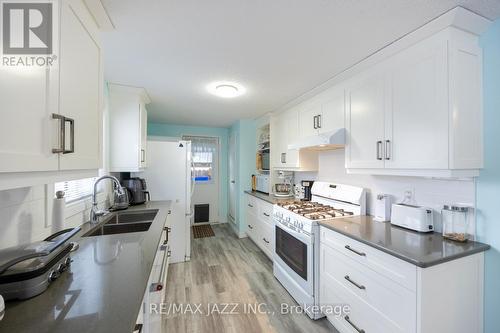 213 Wilmot Trail, Clarington (Bowmanville), ON - Indoor Photo Showing Kitchen With Double Sink