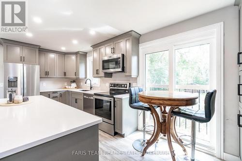 8304 County Road 169, Severn, ON - Indoor Photo Showing Living Room With Fireplace