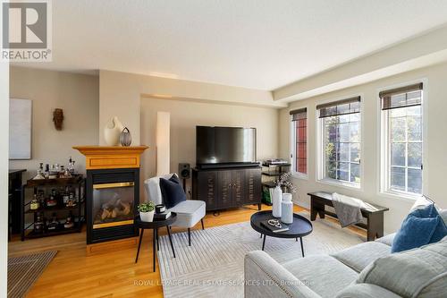 1584 Woodhenge Way, Mississauga, ON - Indoor Photo Showing Living Room With Fireplace