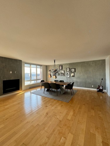 Salon - 514-2160 Av. Terry-Fox, Laval (Chomedey), QC - Indoor Photo Showing Living Room With Fireplace