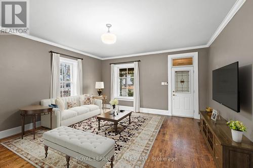 This photograph has been virtually staged. - 6722 Rideau Valley Drive S, Ottawa, ON - Indoor Photo Showing Living Room