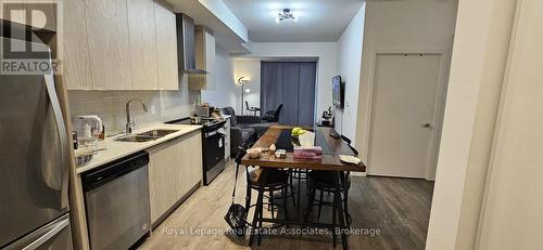 409 - 55 Duke Street W, Kitchener, ON - Indoor Photo Showing Kitchen With Double Sink