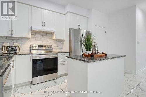 49 Malcolm Crescent, Haldimand, ON - Indoor Photo Showing Kitchen With Stainless Steel Kitchen With Upgraded Kitchen