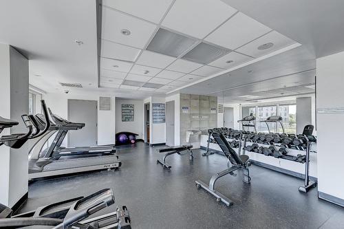 Salle d'exercice - 109-7620 Boul. Marie-Victorin, Brossard, QC - Indoor Photo Showing Gym Room