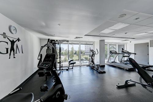 Salle d'exercice - 109-7620 Boul. Marie-Victorin, Brossard, QC - Indoor Photo Showing Gym Room