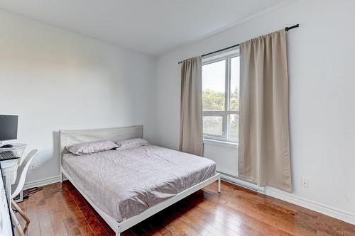 Chambre à coucher principale - 109-7620 Boul. Marie-Victorin, Brossard, QC - Indoor Photo Showing Bedroom