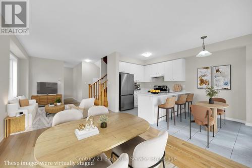 Virtually staged Living/Dining/Kitchen - 9 - 8273 Tulip Tree Drive, Niagara Falls, ON 