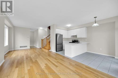 View of main floor from rear of home - 9 - 8273 Tulip Tree Drive, Niagara Falls, ON 