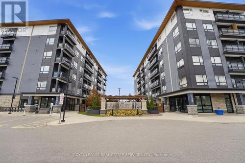 308 - 243 Northfield Drive E, Waterloo, ON - Outdoor With Balcony With Facade