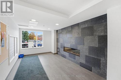 308 - 243 Northfield Drive E, Waterloo, ON - Indoor With Fireplace