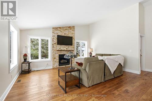 17 Savage Drive, Ottawa, ON - Indoor Photo Showing Living Room With Fireplace