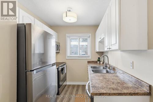 25 - 166 Southdale Road W, London South (South O), ON - Indoor Photo Showing Kitchen With Double Sink