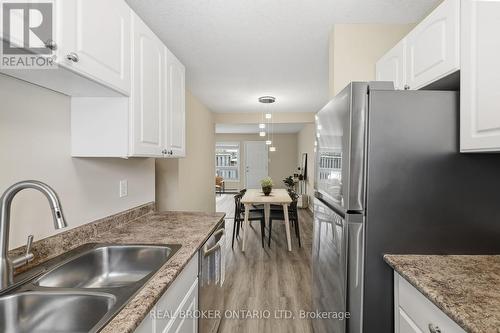 25 - 166 Southdale Road W, London South (South O), ON - Indoor Photo Showing Kitchen With Double Sink