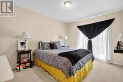 Primary Bedroom With Balcony - 