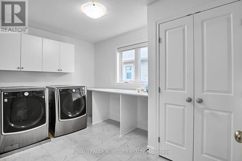 Second-floor laundry - 32 Aconitum Way, Ottawa, ON - Indoor Photo Showing Laundry Room