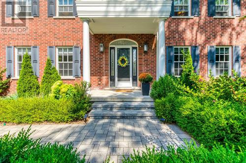 Backs onto Ravine & All interior Doors are Custom - 215 Dock Road, Barrie, ON - Outdoor With Facade