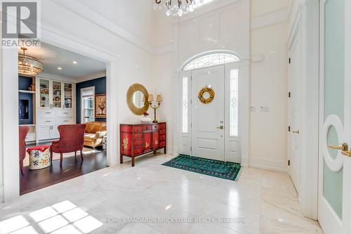 Entrance Door with a Beautiful Designer Chandelier - 215 Dock Road, Barrie, ON - Indoor Photo Showing Other Room