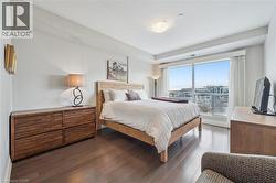 Bedroom featuring wood finished floors - 