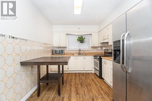 163 Connaught Avenue N, Hamilton, ON - Indoor Photo Showing Kitchen With Double Sink