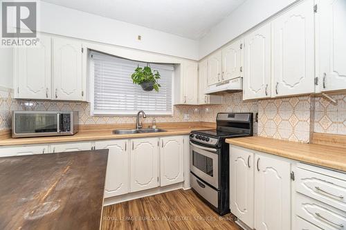163 Connaught Avenue N, Hamilton, ON - Indoor Photo Showing Kitchen With Double Sink