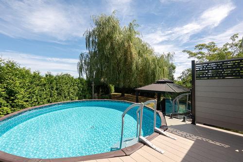 Piscine - 51 Rue Anatole-Touchette, Saint-Jean-Sur-Richelieu, QC - Outdoor With Above Ground Pool