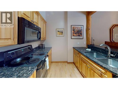 4430 Red Mountain Road Unit# 4, Rossland, BC - Indoor Photo Showing Kitchen With Double Sink