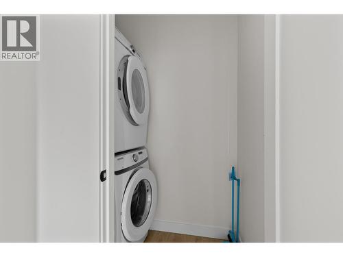 Laundry room on upper floor - 2825 Richter Street Unit# 3, Kelowna, BC - Indoor Photo Showing Laundry Room