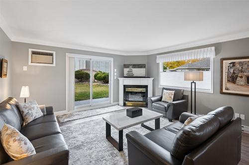 109-8700 Jubilee Road, Summerland, BC - Indoor Photo Showing Living Room With Fireplace