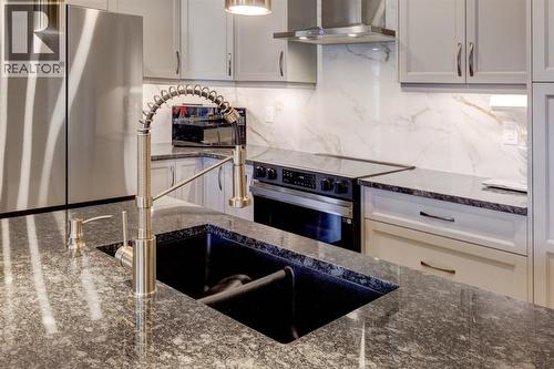 2238 Windbury Greenway Sw, Airdrie, AB - Indoor Photo Showing Kitchen With Stainless Steel Kitchen With Double Sink With Upgraded Kitchen