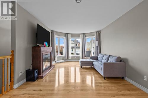 54 Goldfinch Drive, Paradise, NL - Indoor Photo Showing Living Room With Fireplace