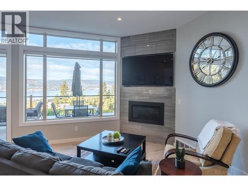 2864 Arawana Road, Naramata, BC - Indoor Photo Showing Living Room With Fireplace
