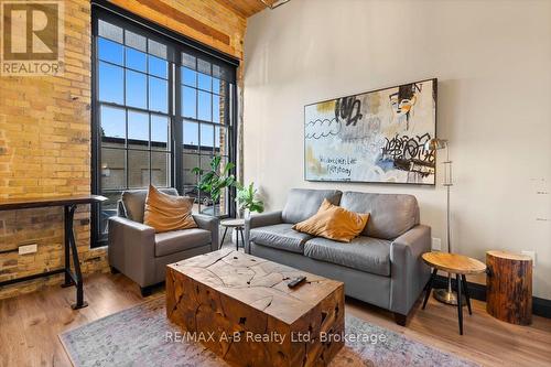 112 - 245 Downie Street, Stratford, ON - Indoor Photo Showing Living Room