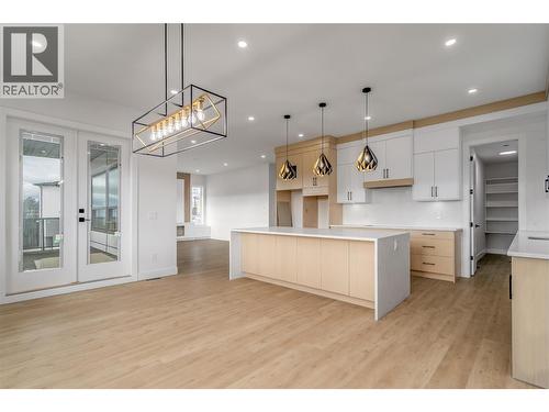 Dining Room and Kitchen - 1148 Hume Avenue, Kelowna, BC - Indoor Photo Showing Kitchen With Upgraded Kitchen