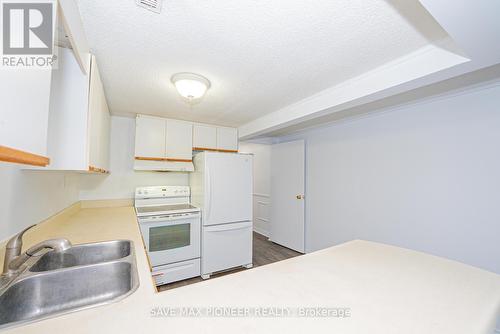 122 Centre Street N, Brampton, ON - Indoor Photo Showing Kitchen With Double Sink