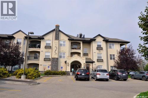 B107 415 Hunter Road, Saskatoon, SK - Outdoor With Facade