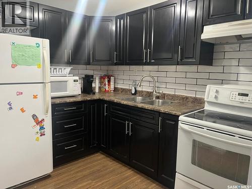 439 Henick Crescent, Saskatoon, SK - Indoor Photo Showing Kitchen With Double Sink
