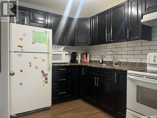 439 Henick Crescent, Saskatoon, SK - Indoor Photo Showing Kitchen With Double Sink
