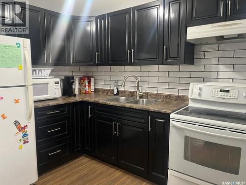439 Henick Crescent, Saskatoon, SK - Indoor Photo Showing Kitchen With Double Sink