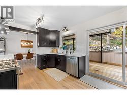 New windows and over-sized sliding door to your backyard retreat. - 